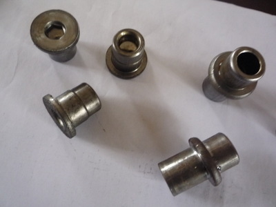 金属成型设备的工业利器 多功位成型机、零件成型机与螺母机